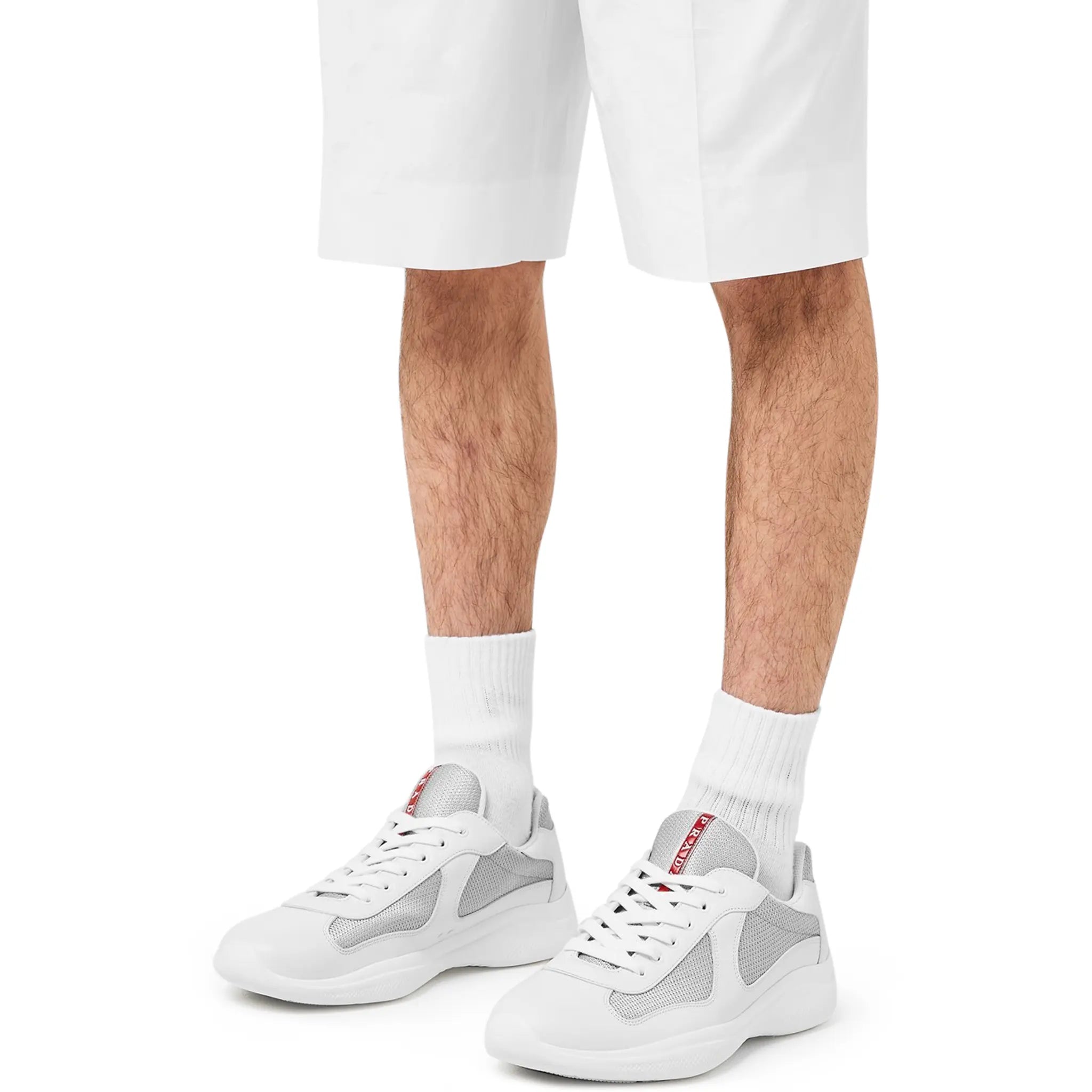 Model side view of Prada Americas Cup White Sneaker 4E6500_3LLJ_F0009_F_025