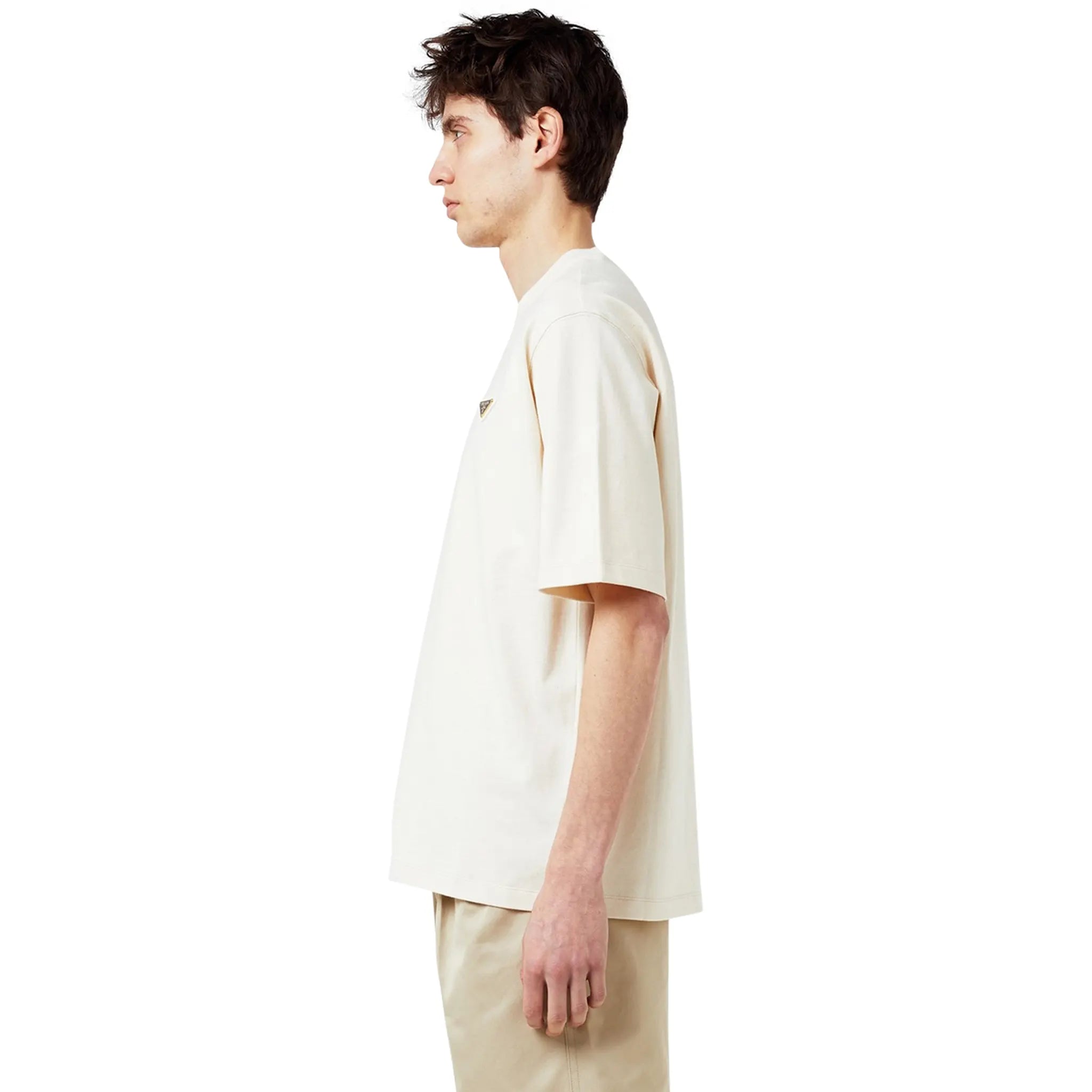 Model side view of Prada Chest Logo Cotton Natural T Shirt