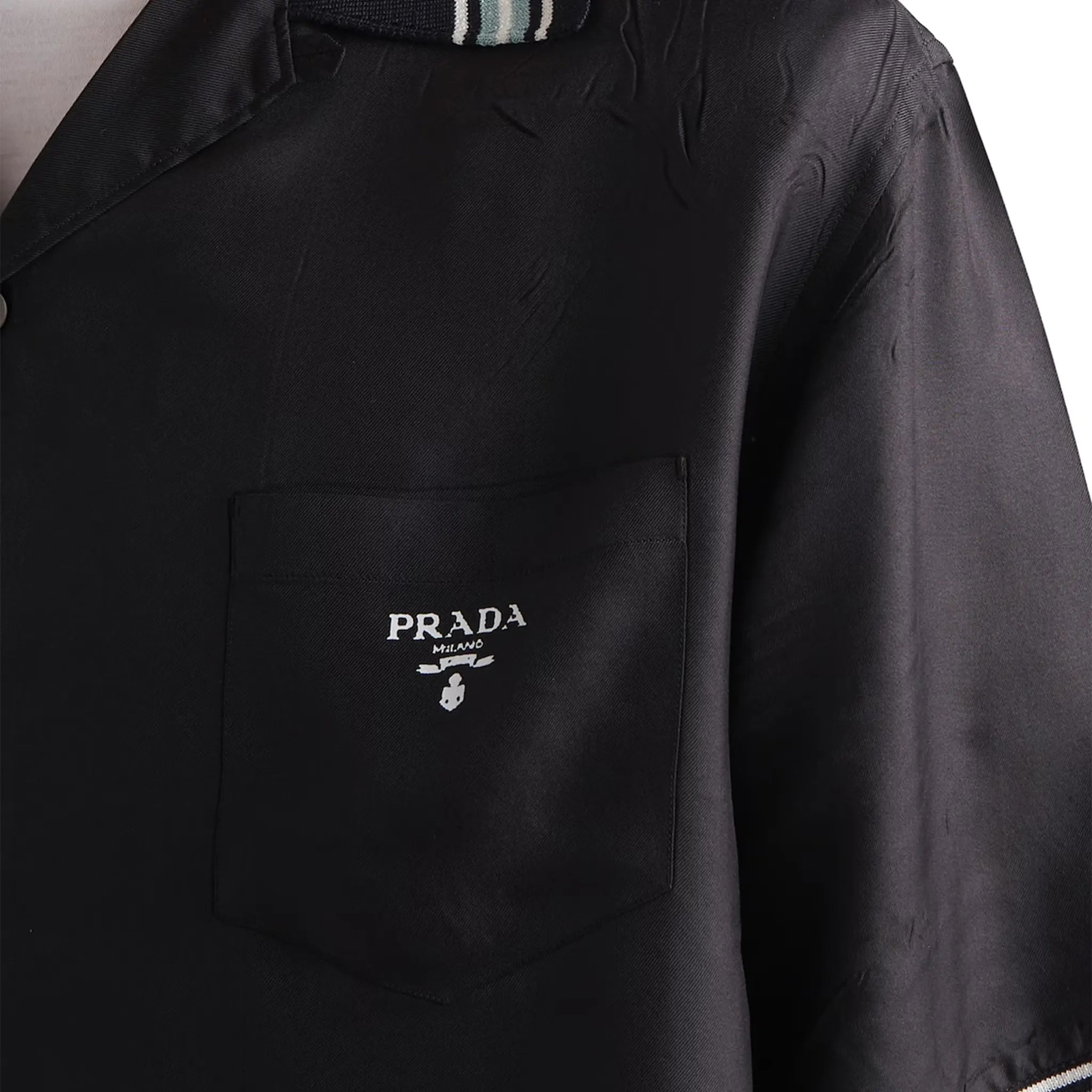 Detail view of Prada Silk Twill Short Sleeved Logo Black Shirt UCS501_1QWC_F0002_S_OOO