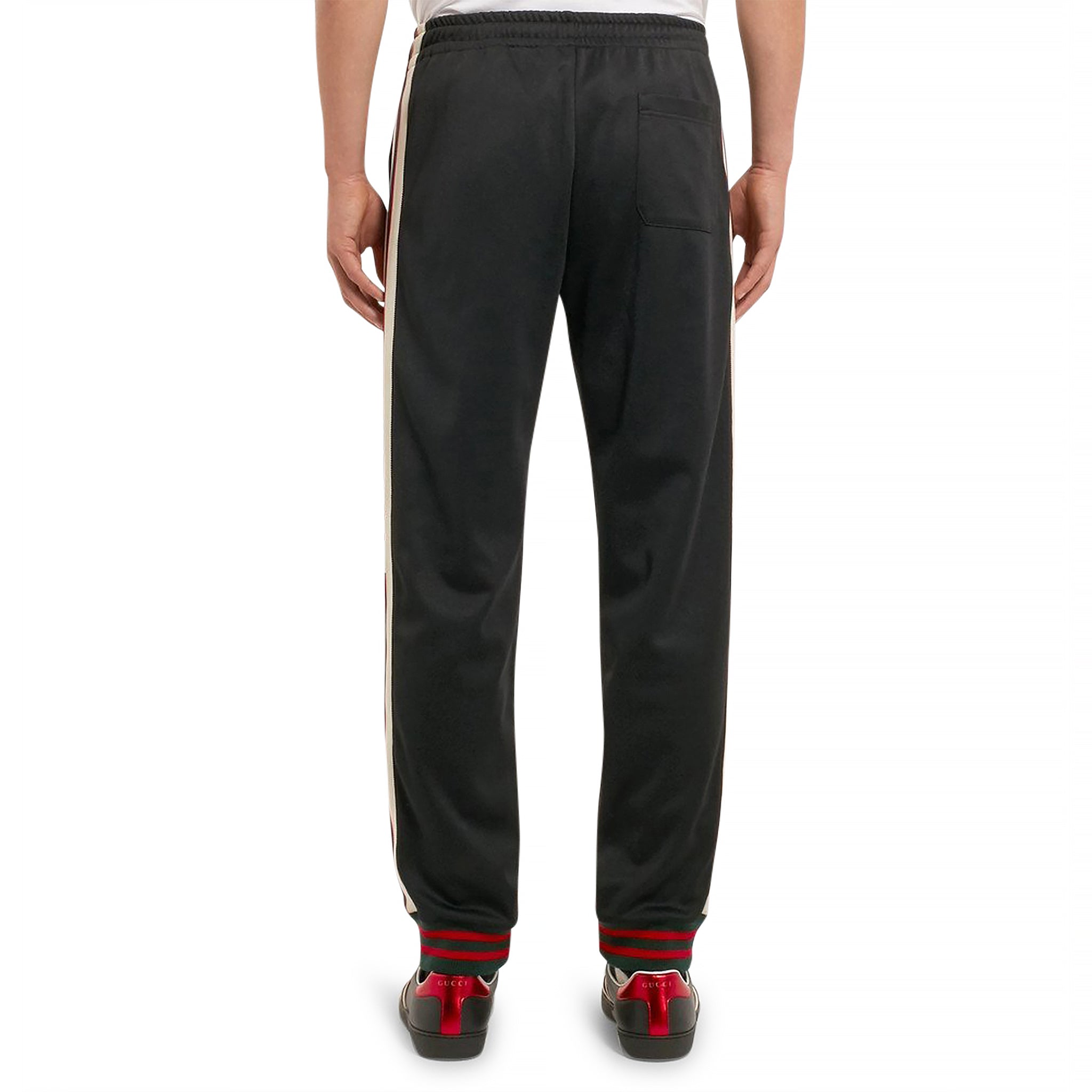 Model back view of Preloved - Gucci Side Stripe Black Sweatpants