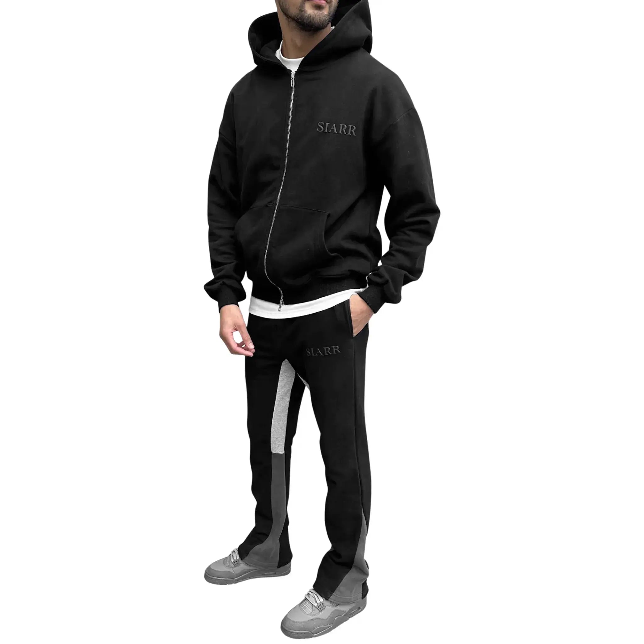 Model side view of SIARR Black Flared Joggers