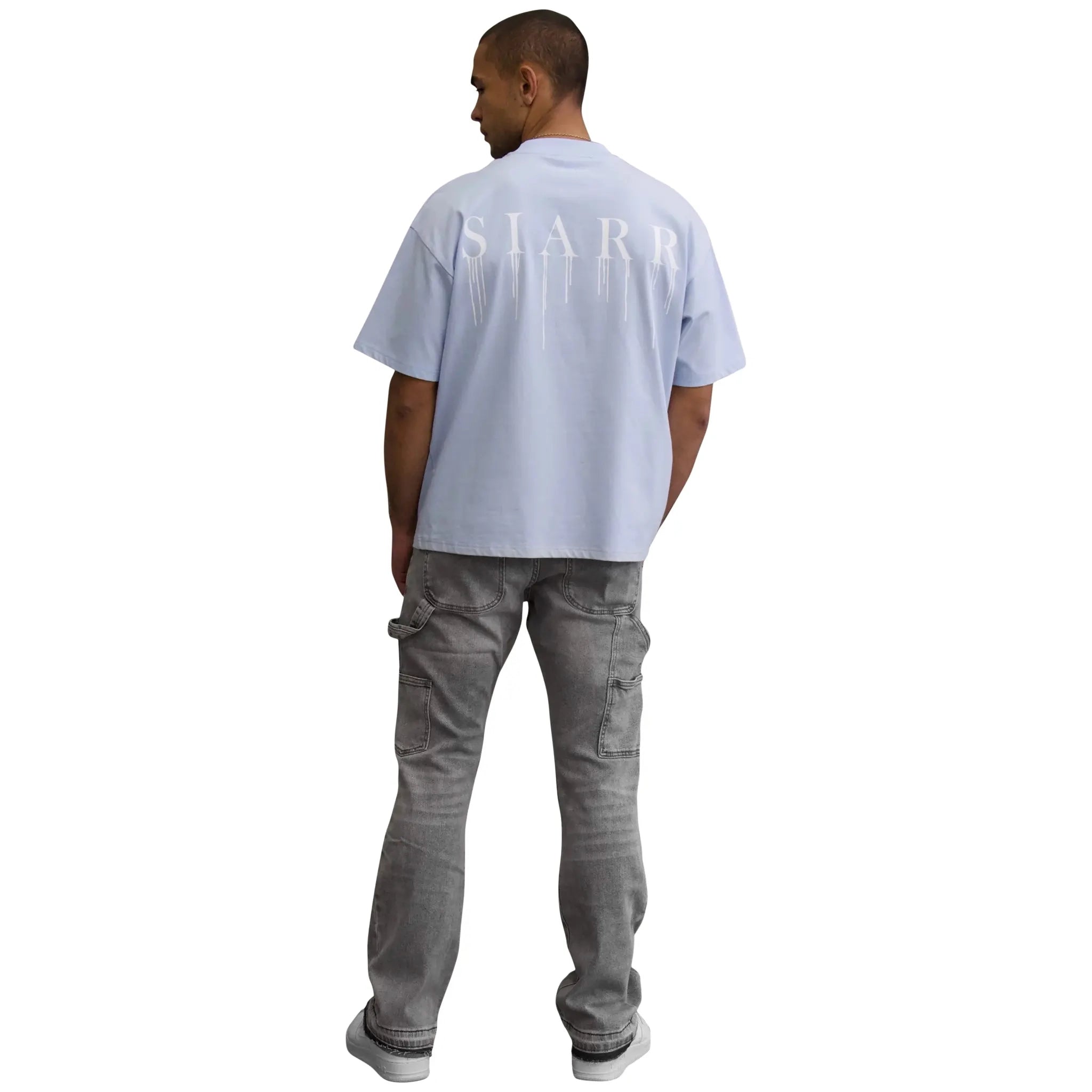 Model back view of SIARR Carpenter Jeans Light Grey