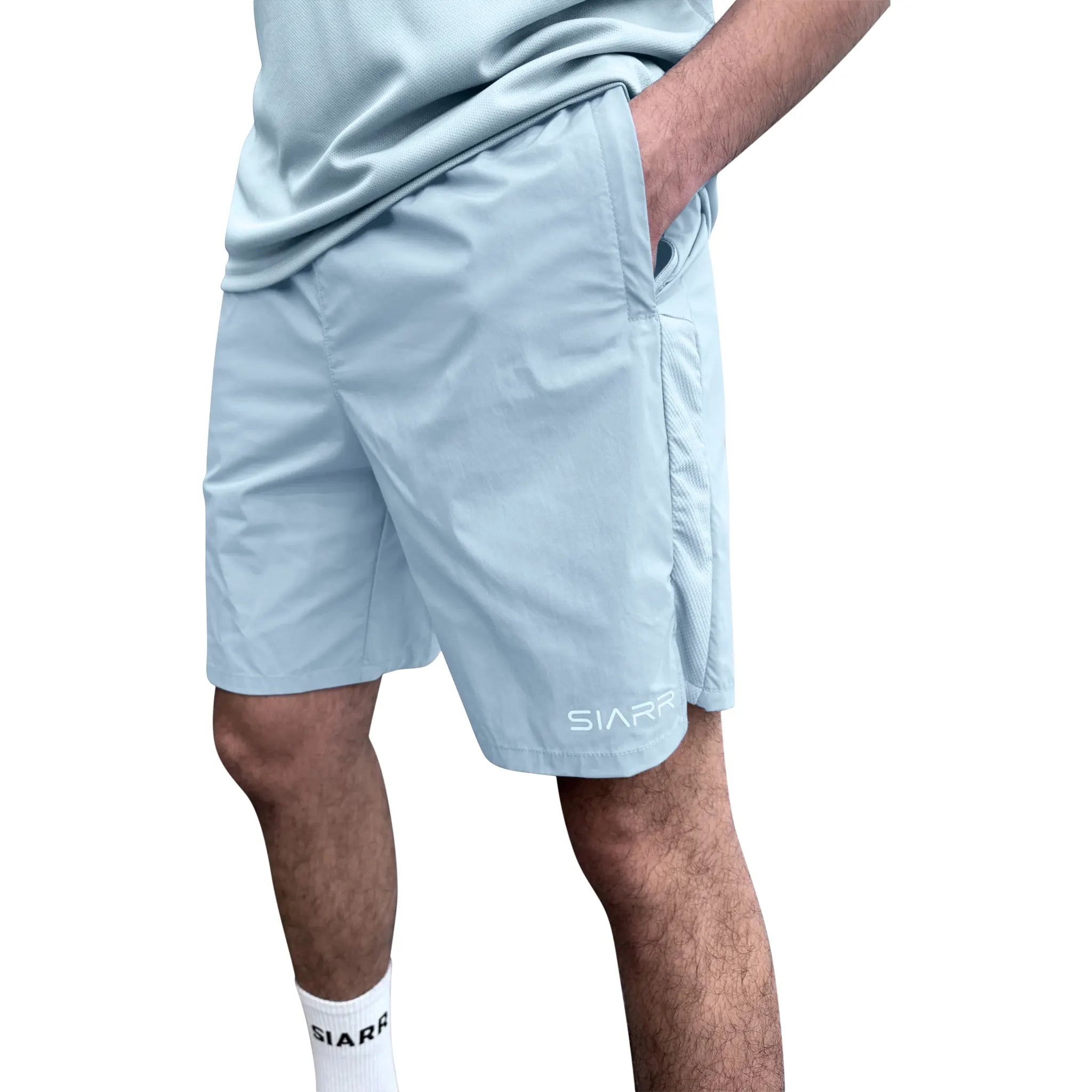 Model side view of Siarr Performance Baby Blue Shorts