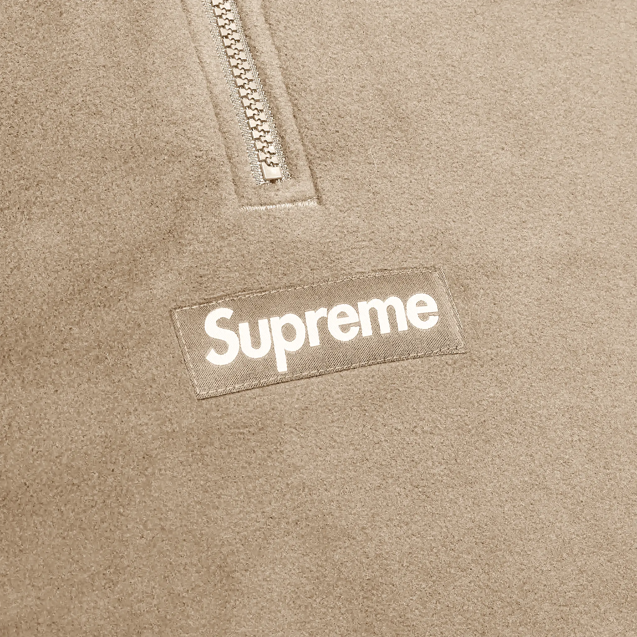 Front detail view of Supreme Polartec Facemask Taupe Half-Zip Hoodie (FW24)