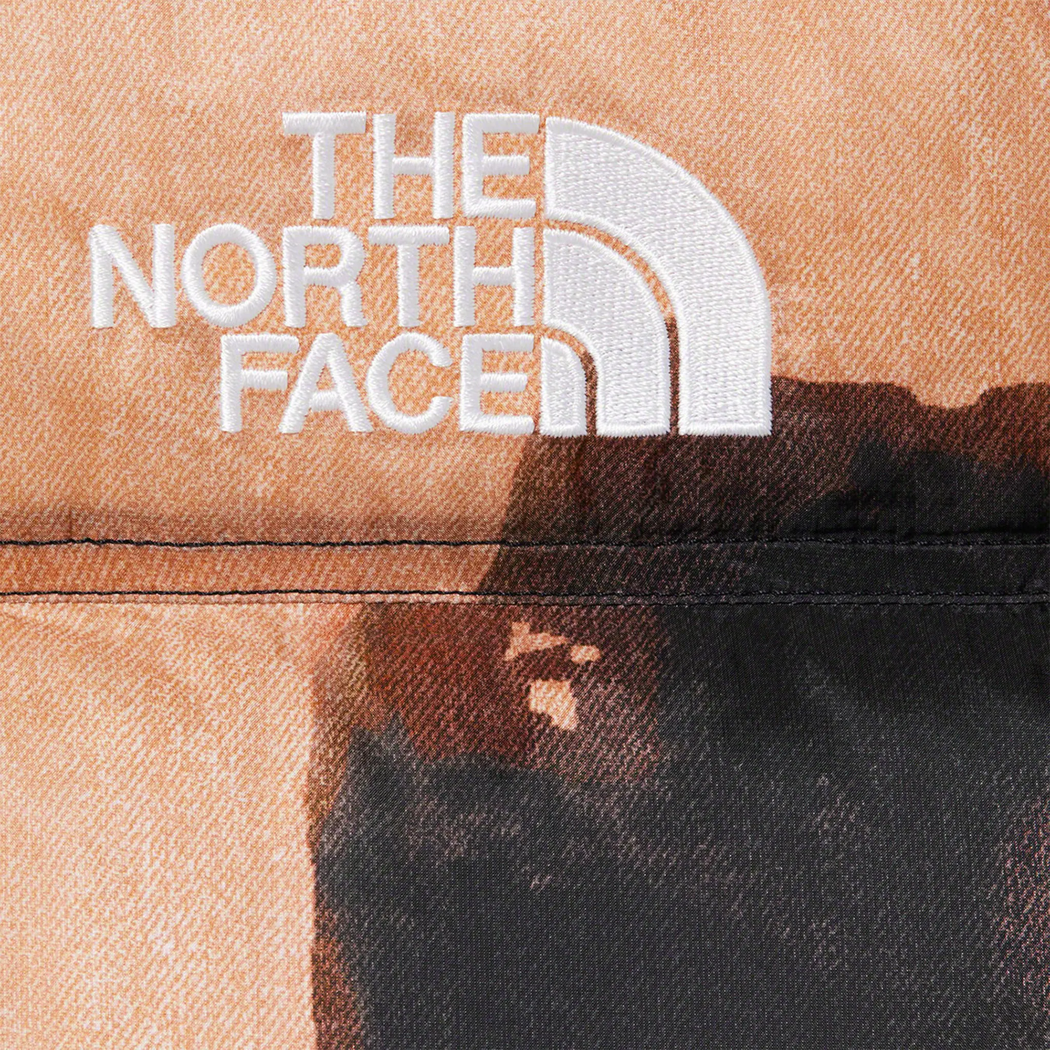 Detail view of Supreme x The North Face Nupste Bleached Denim Jacket SU11270