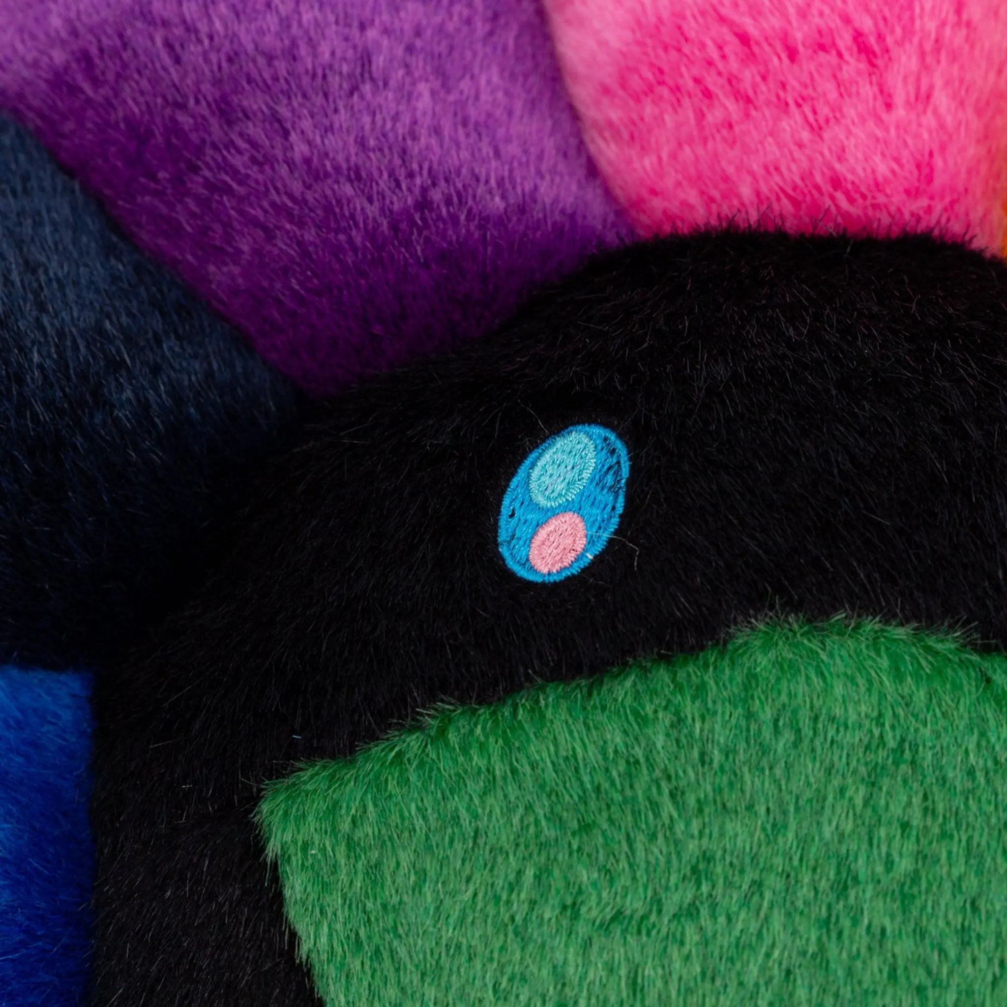 Detail view of Takashi Murakami Kaikai Kiki Flower Plush Rainbow Black