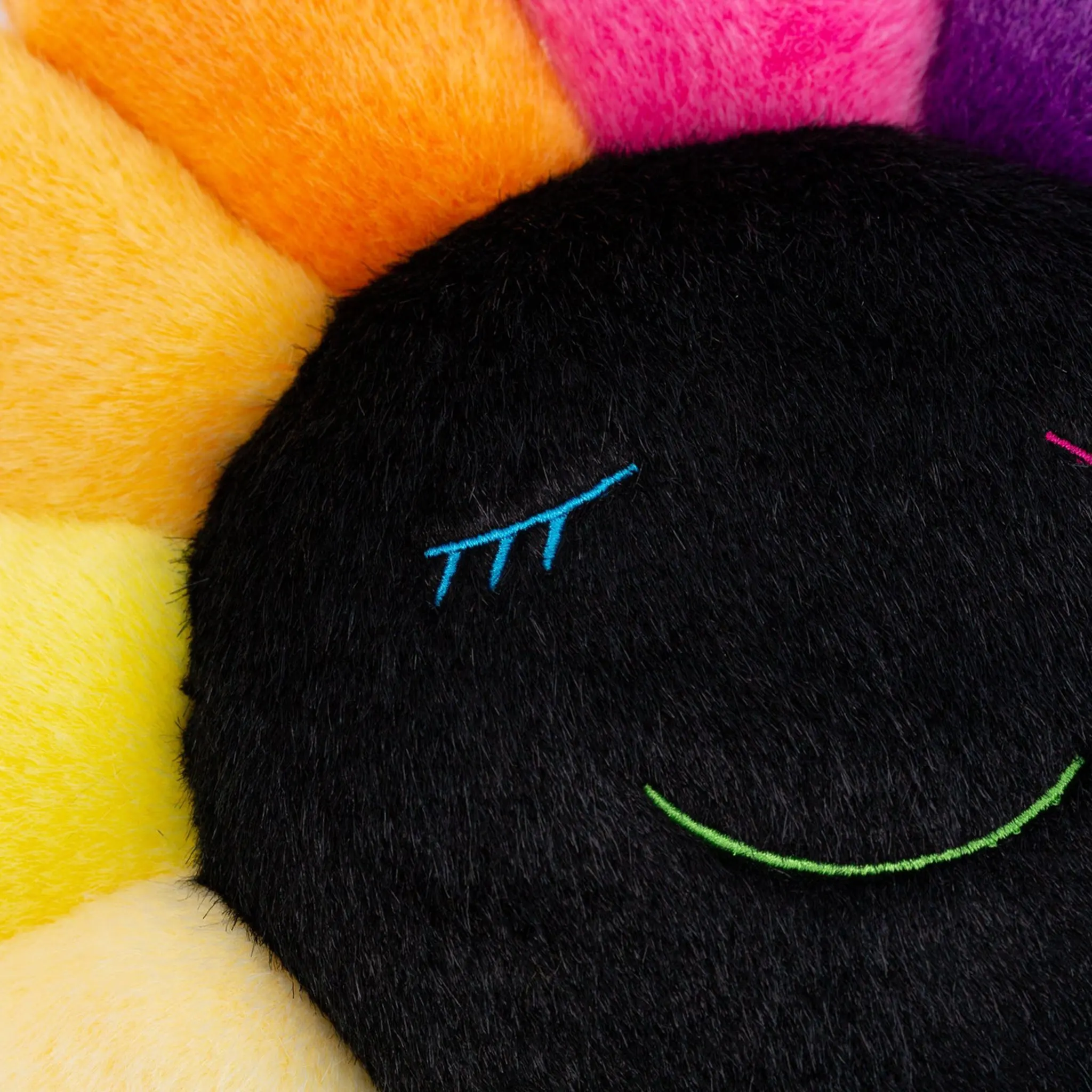 Detail view of Takashi Murakami Kaikai Kiki Flower Plush Rainbow Black