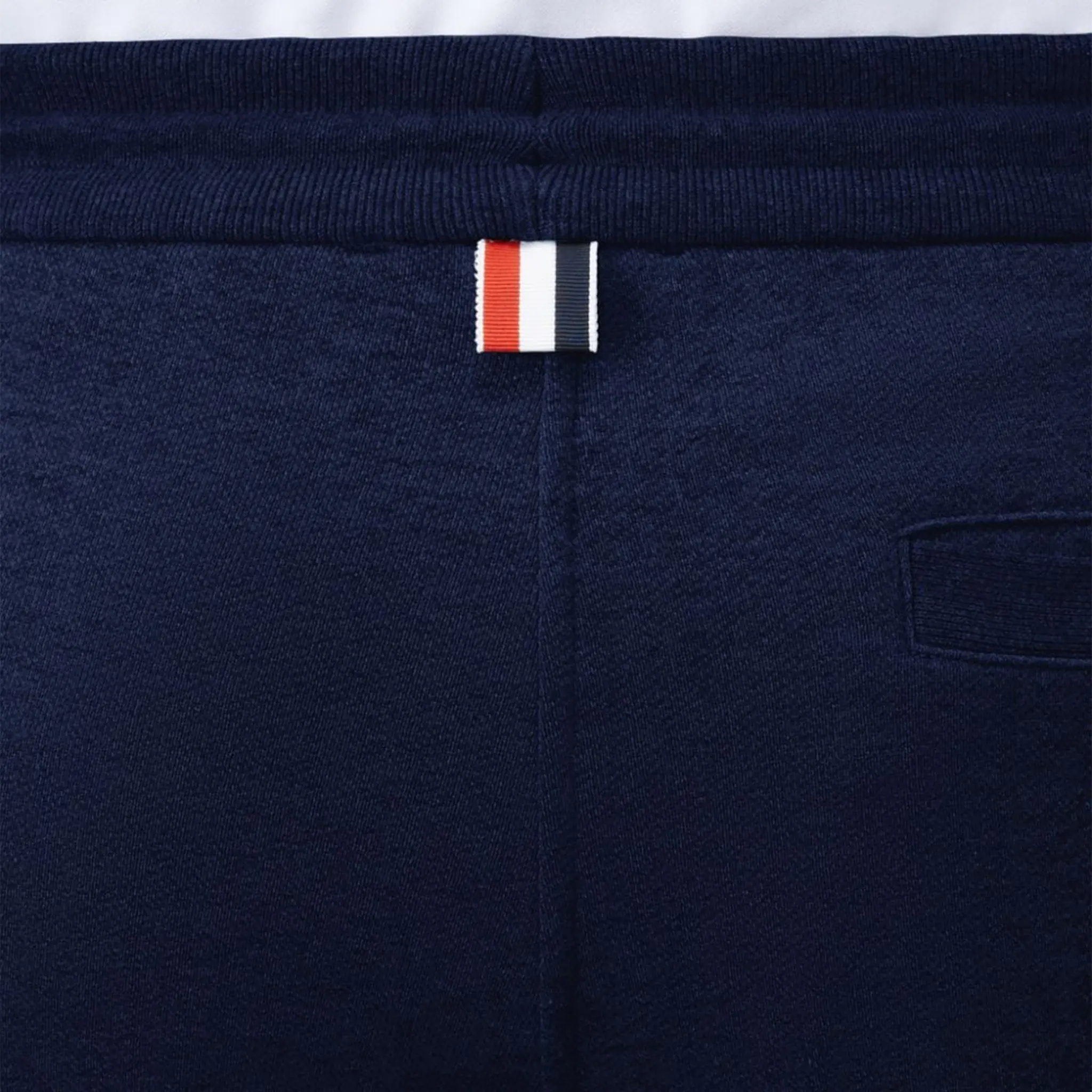 Detail view of Thom Browne Classic Loopback 4-Bar Blue Sweat Shorts MJQ012A-06910-415