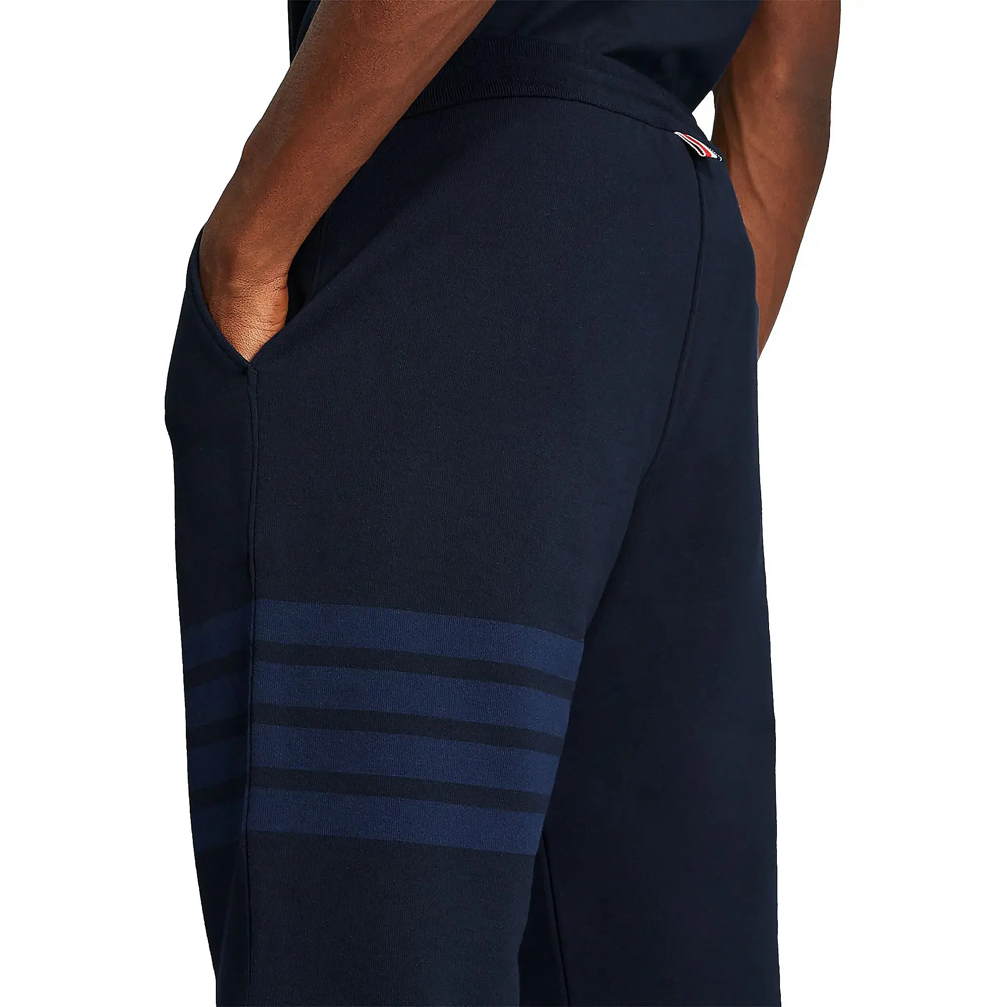 Model detail view of Thom Browne Classic Loopback 4-Bar Blue Sweatpants MJQ008A-06910-415