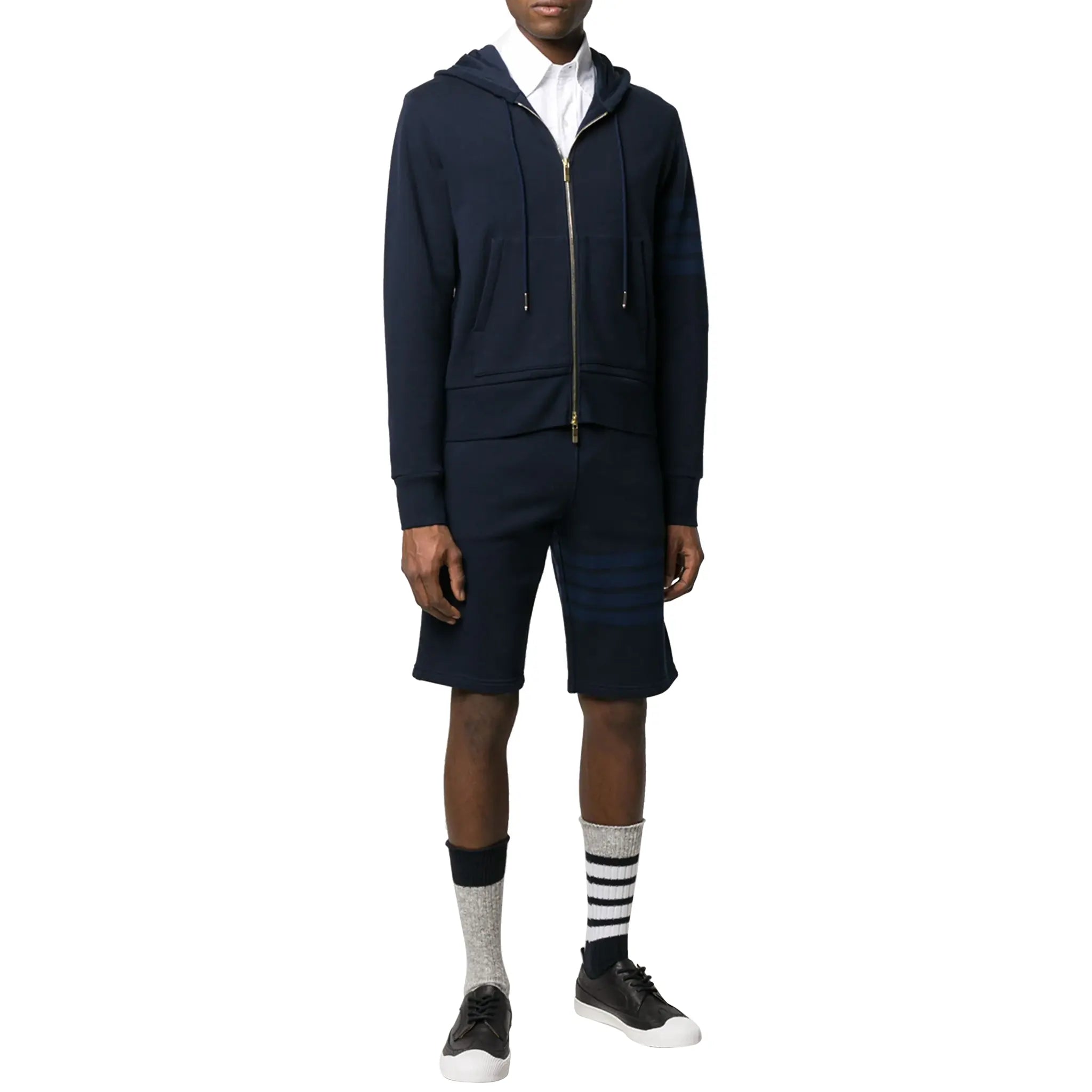 Model view of Thom Browne Classic Loopback 4 Bar Tonal Full Zip Blue Hoodie MJT249A-06910-415