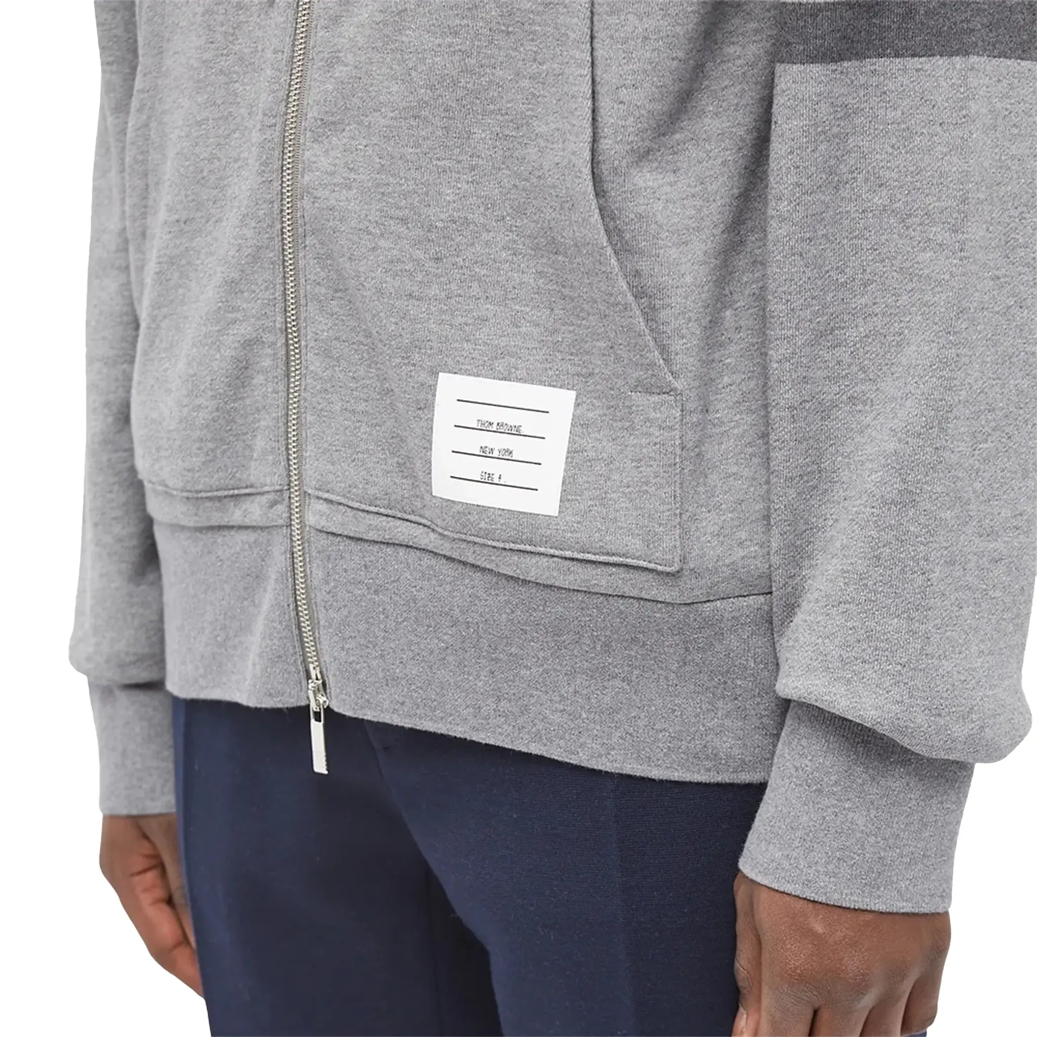 Detail view of Thom Browne Classic Loopback 4 Bar Tonal Full Zip Medium Grey Hoodie MJT249A-06910-035