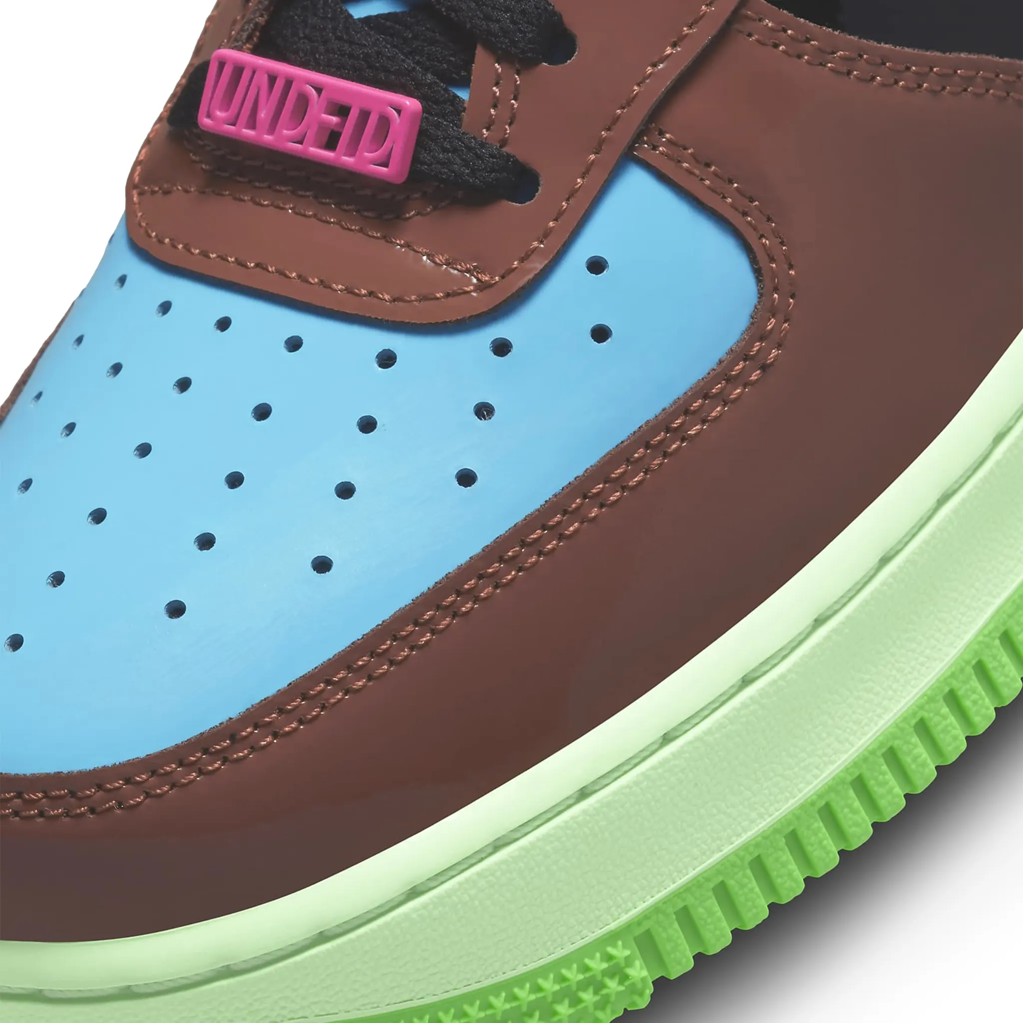 Toe box view of Undefeated x Nike Air Force 1 Low Pink Prime DV5255-200